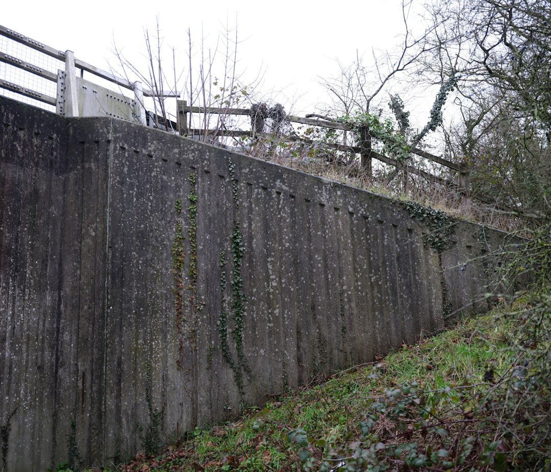 13. Installing a Retaining Wall With Unapproved Materials (Image Credits: Unsplash)