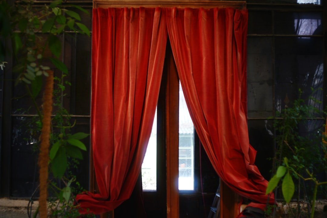 #8 - Heavy, Dark Drapes That Block Natural Light (Image Credits: Unsplash)