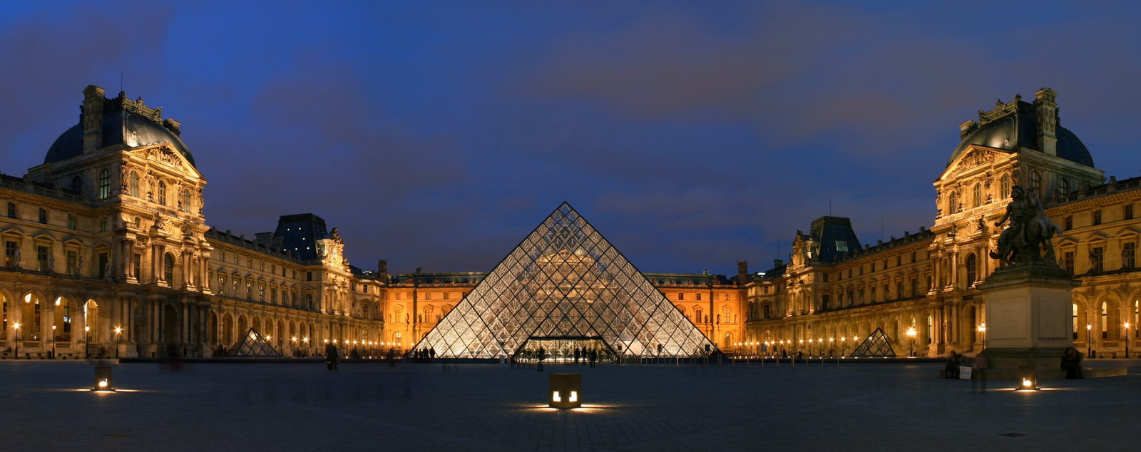 Courtyard of the Museum of Louvre, and its pyramid. This picture is a panorama made from stitching three pictures with Hugin.