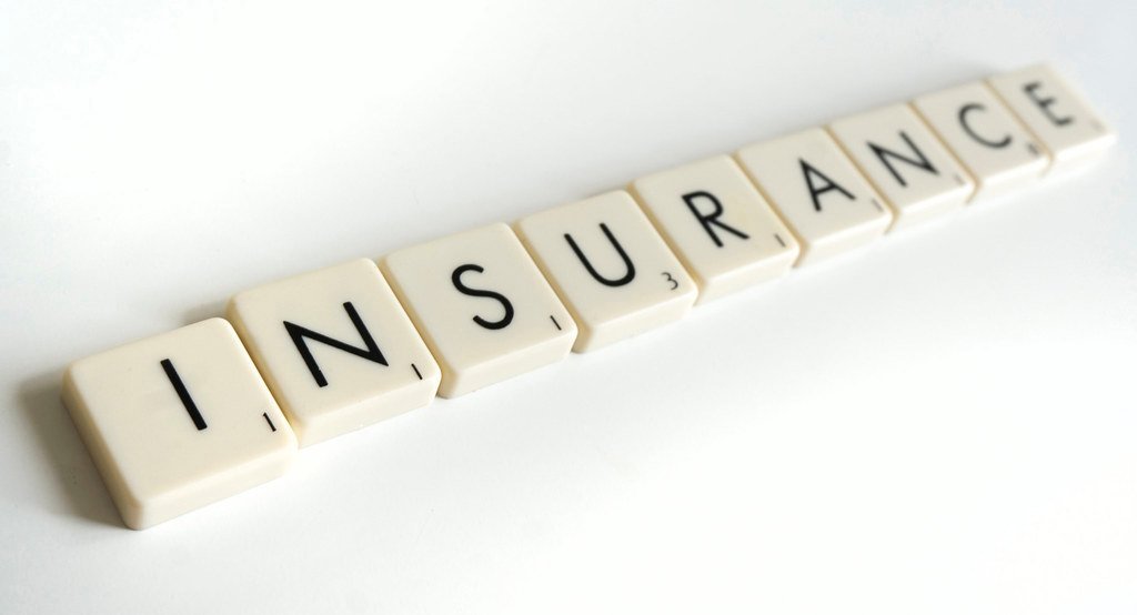 #5 - Skipping Travel Insurance or Buying the Wrong Kind (free pictures of money, Flickr, CC BY 2.0)