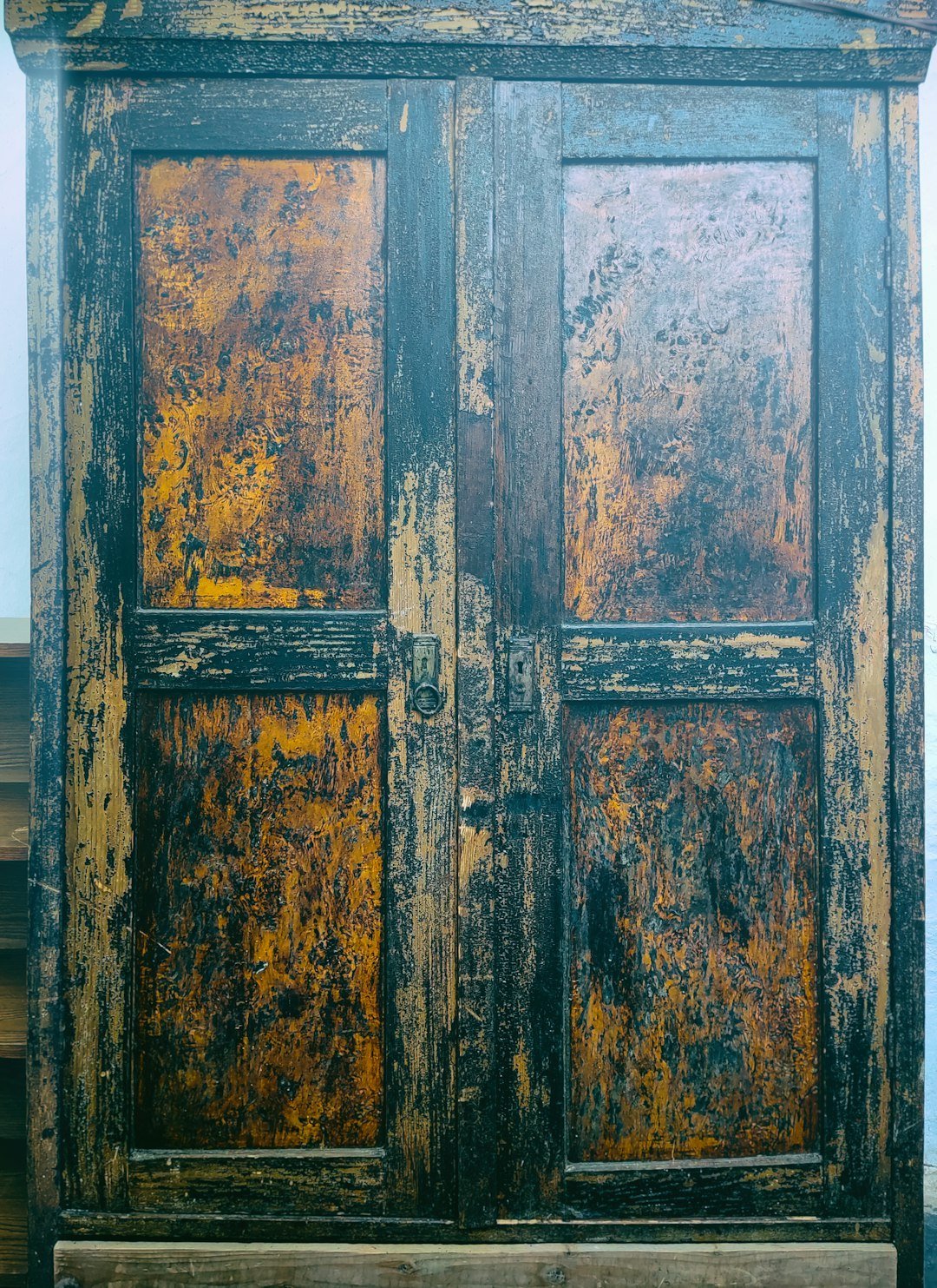 #5 - Worn, Scratched, or Peeling Cabinet Doors (Image Credits: Unsplash)