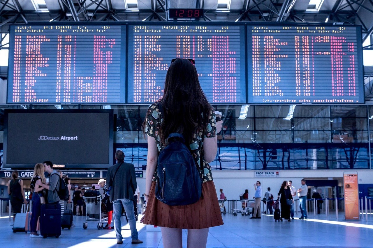 #12 - Standing Under the Departure Board Instead of Checking the App (Image Credits: Pixabay)
