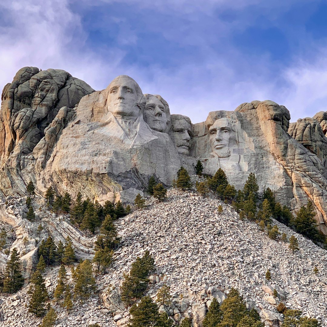 #8 - Mount Rushmore, South Dakota: A Very Long Drive to See Smaller Faces Than You Expected (Image Credits: Unsplash)